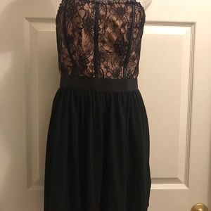 Black dress with a natural Satin&Lace corset top..